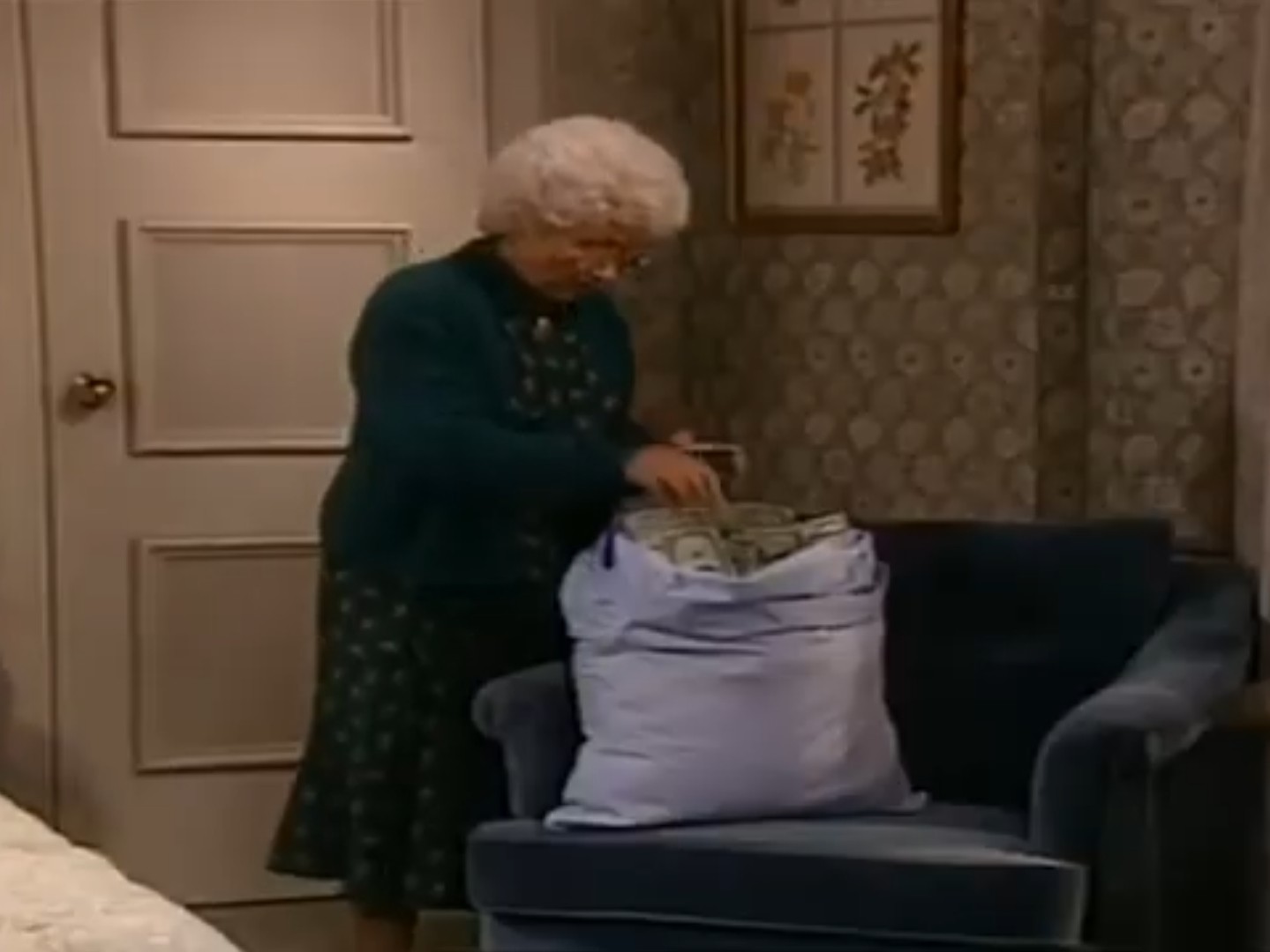 Sophia with a pillowcase full of cash