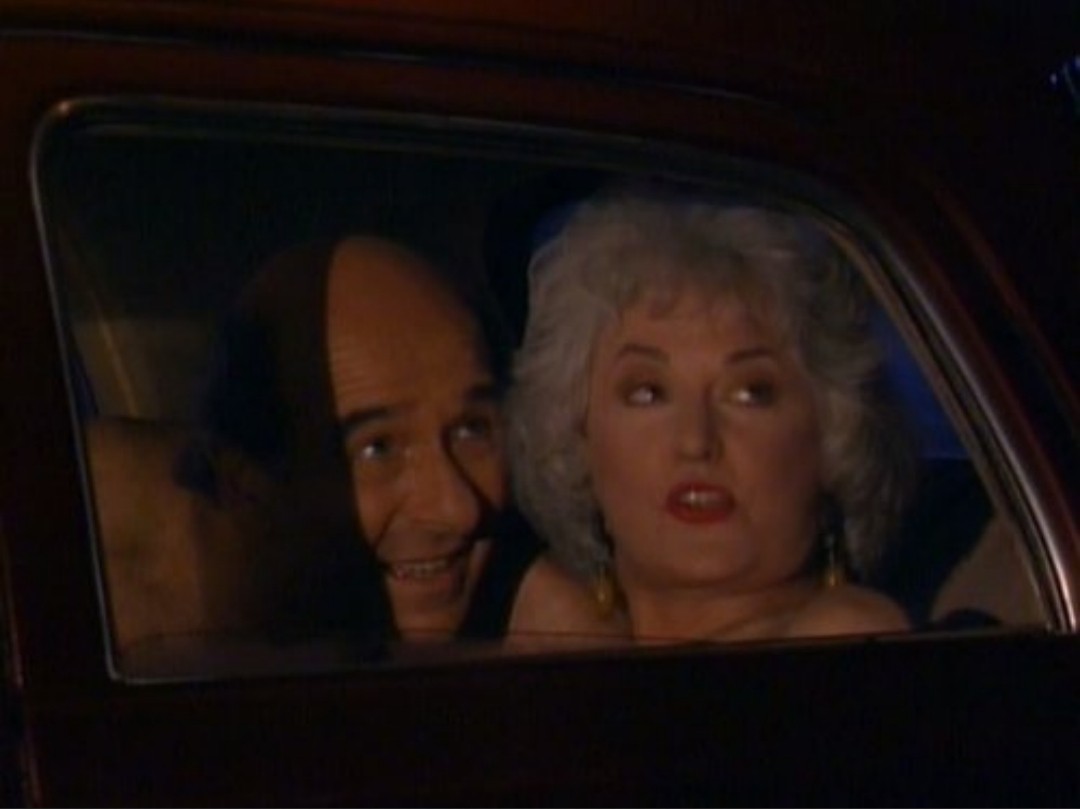Dorothy and Stan naked in the back of a car