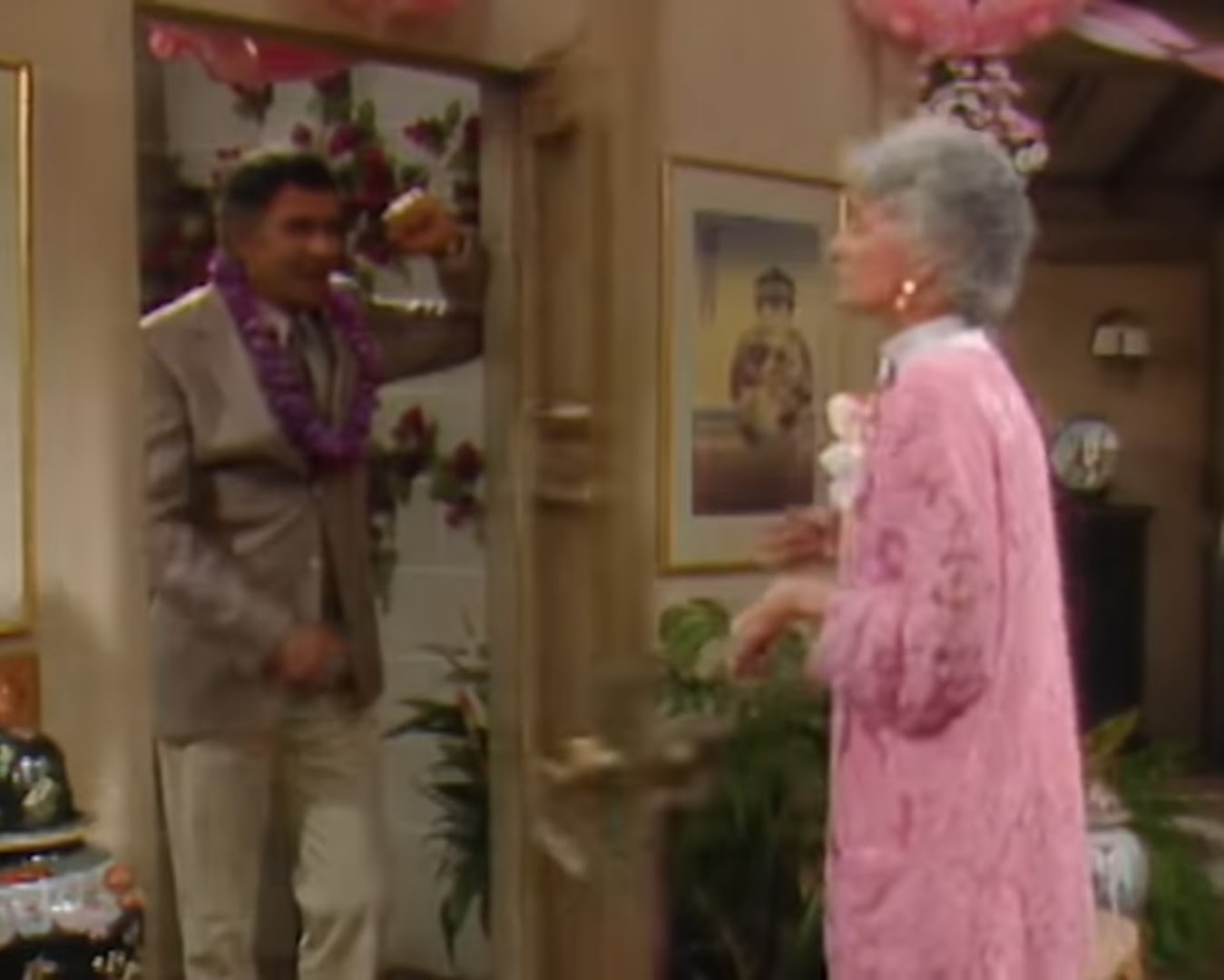 Stan at the door, Dorothy about to slam it