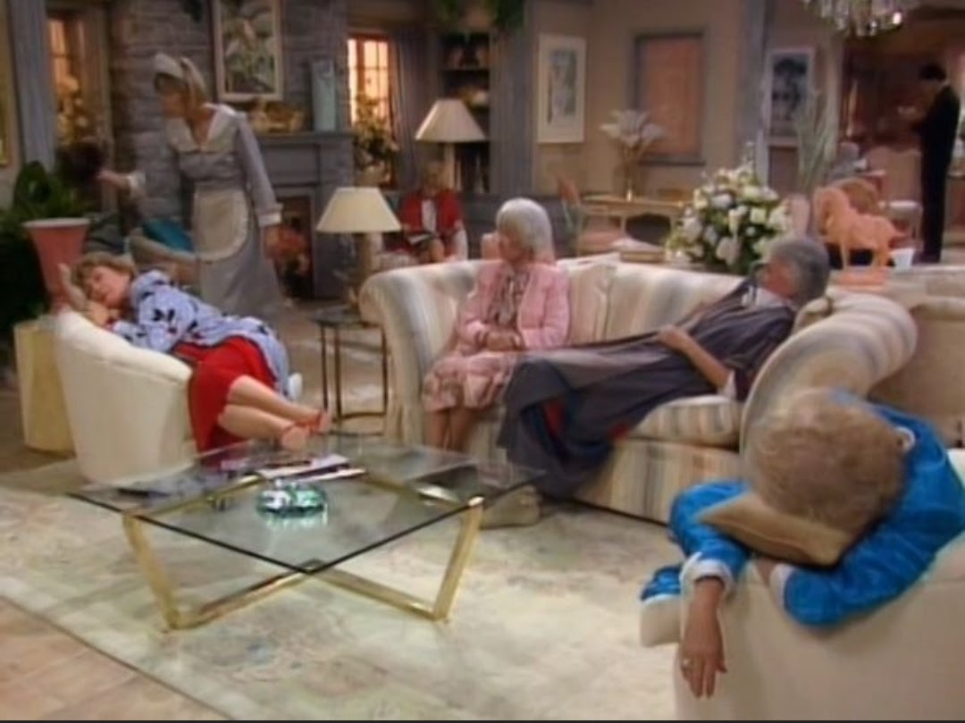 The girls sleeping in a hotel lobby